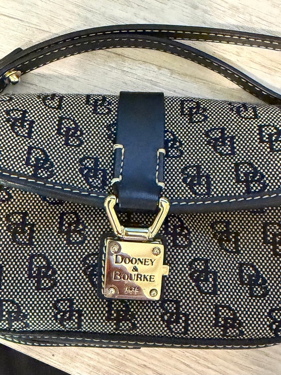 Dooney & Bourke Handbags - Dooney & Bourke Black and Tan Signature Clutch with Gold Hardware